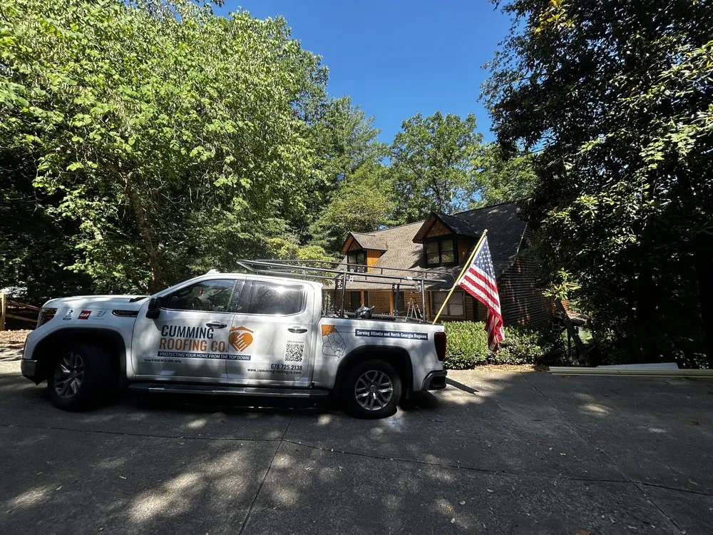 Slide of Cumming Roofing Company