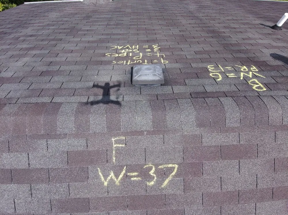 Slide of Cumming Roofing Company