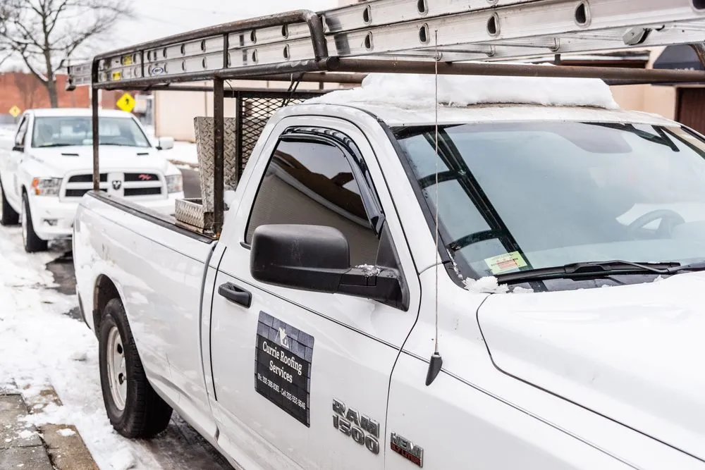 Slide of Currie Roofing Services