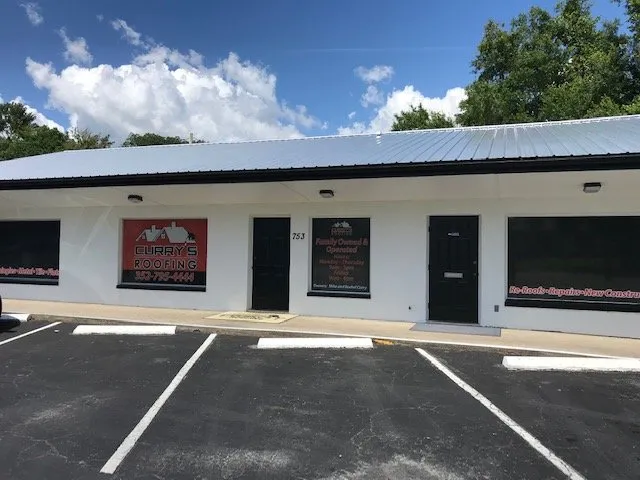 Slide of Curry's Roofing