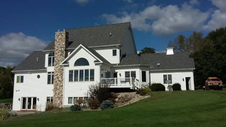 Slide of Curtin Roofing