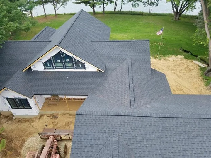 Slide of Curtin Roofing