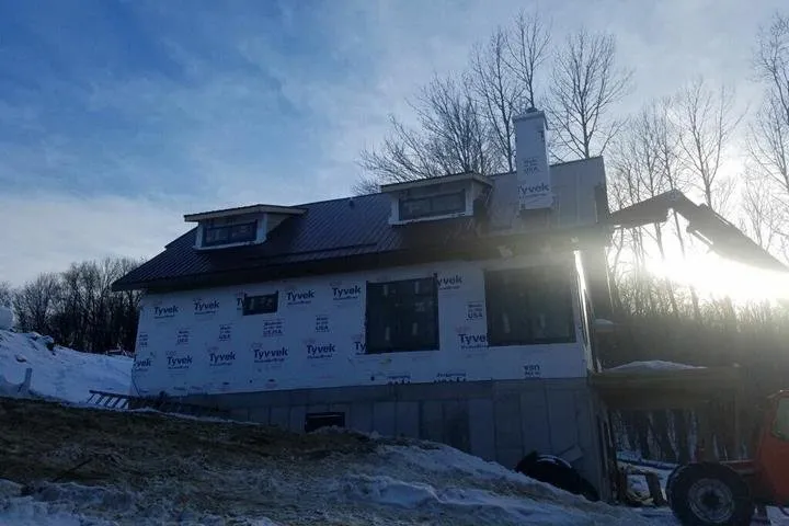 Slide of Curtin Roofing