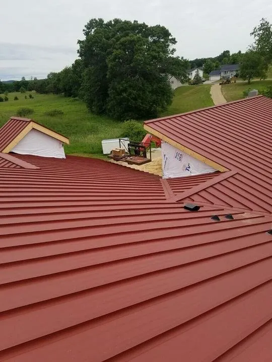 Slide of Curtin Roofing