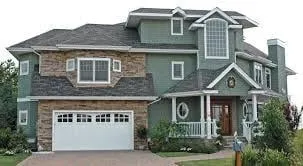 Professional flat roof repair for residential properties across Oxford, IA - Custom Construction Inc.