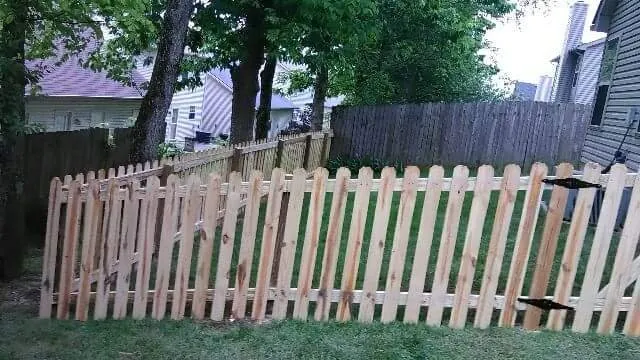 Slide of Custom Fence and Roofing