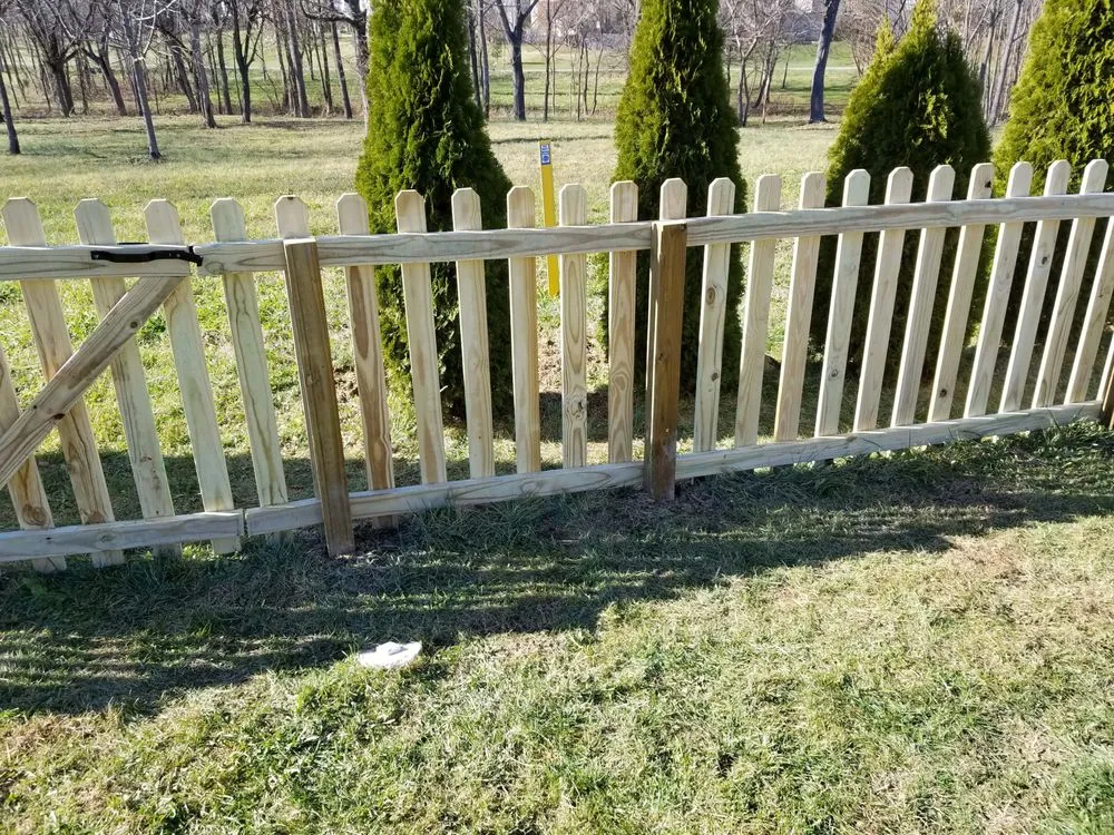Slide of Custom Fence and Roofing