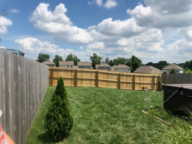 Slide of Custom Fence and Roofing