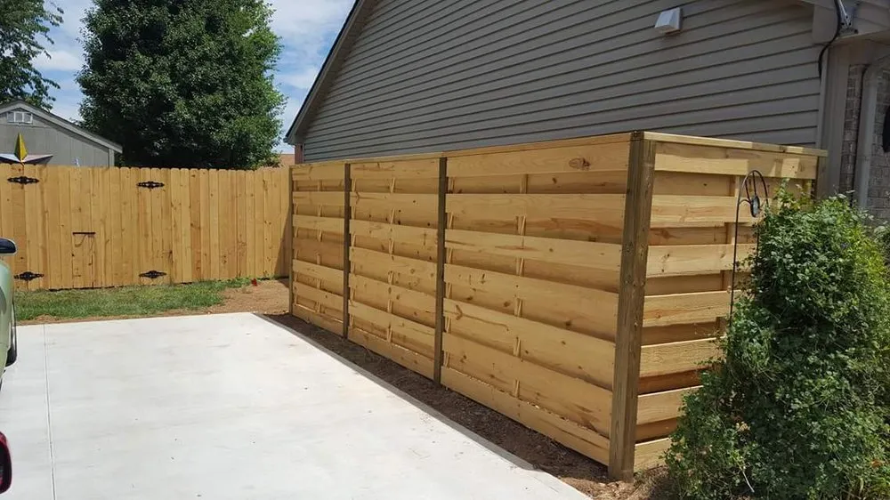 Slide of Custom Fence and Roofing