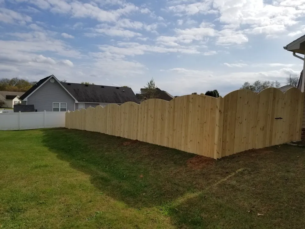 Slide of Custom Fence and Roofing