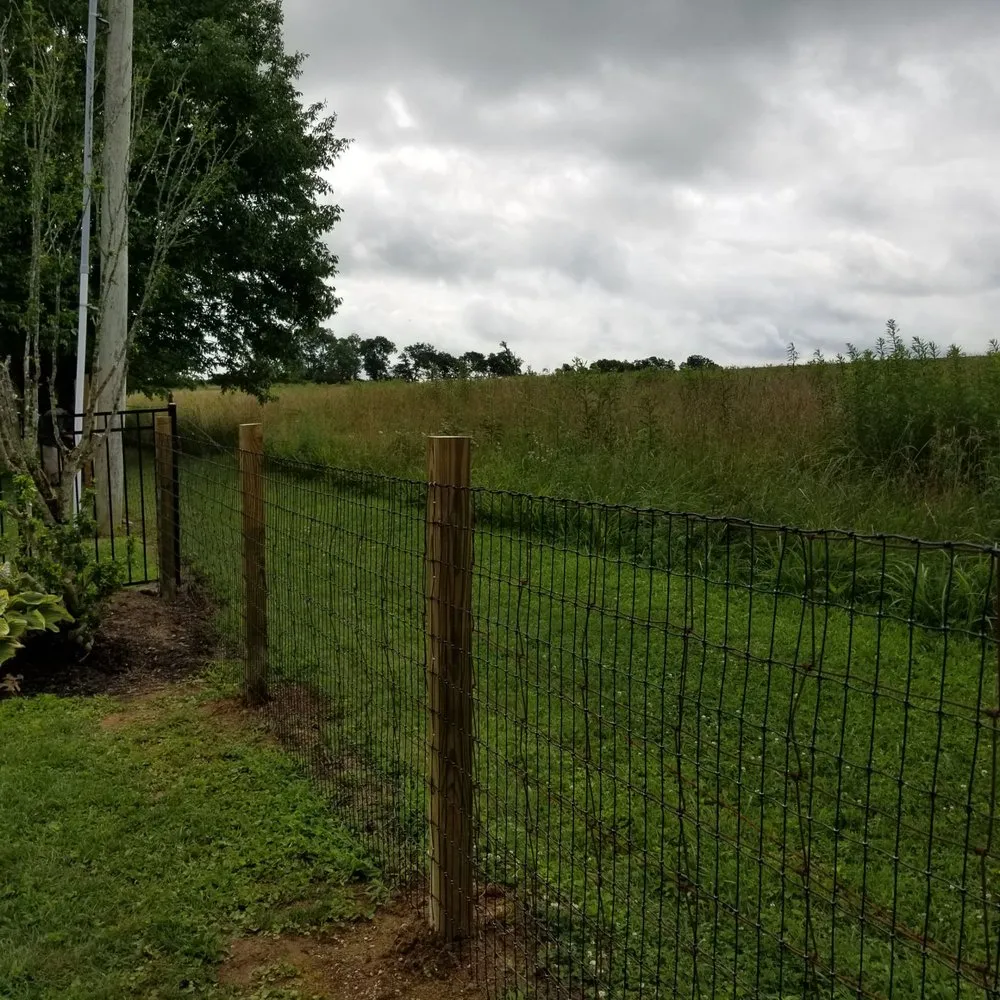 Slide of Custom Fence and Roofing