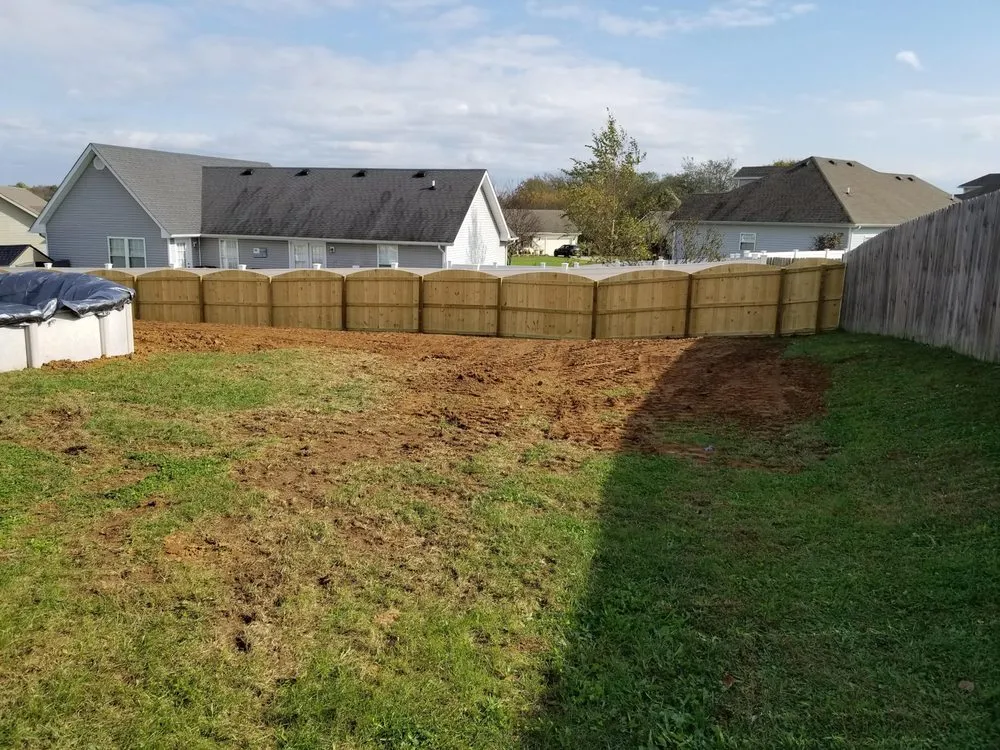 Slide of Custom Fence and Roofing