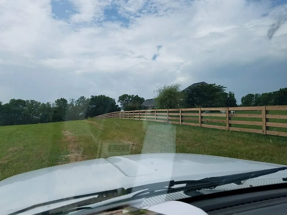 Slide of Custom Fence and Roofing