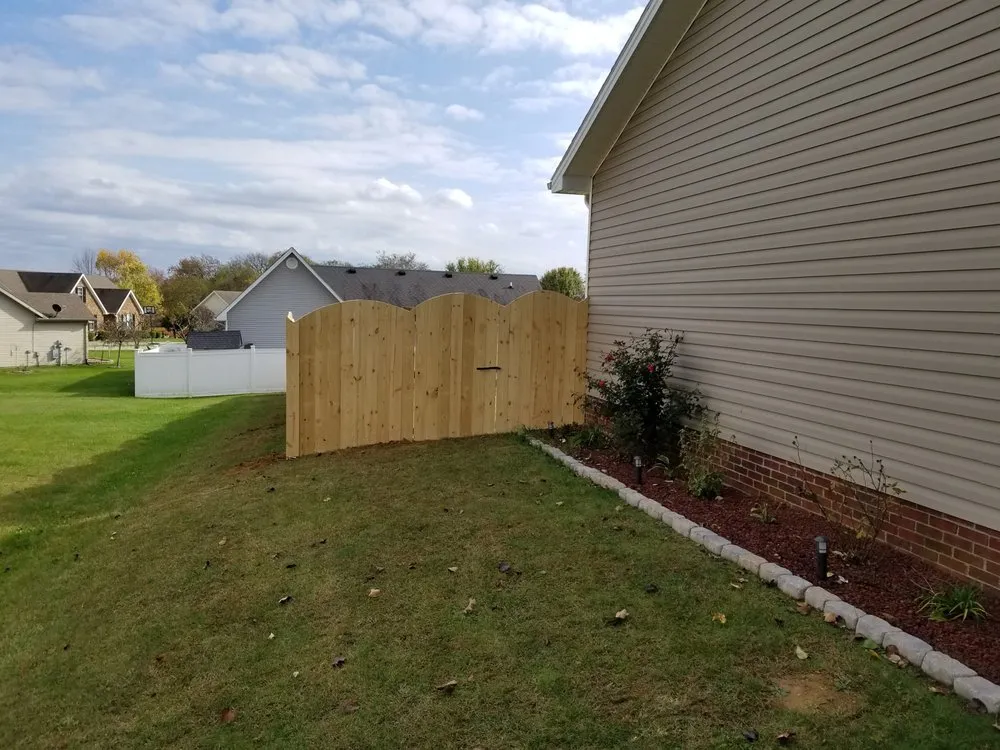 Slide of Custom Fence and Roofing