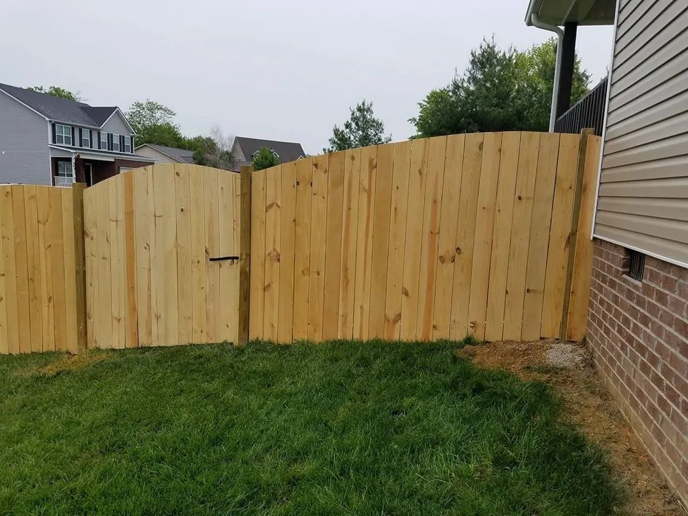 Slide of Custom Fence and Roofing