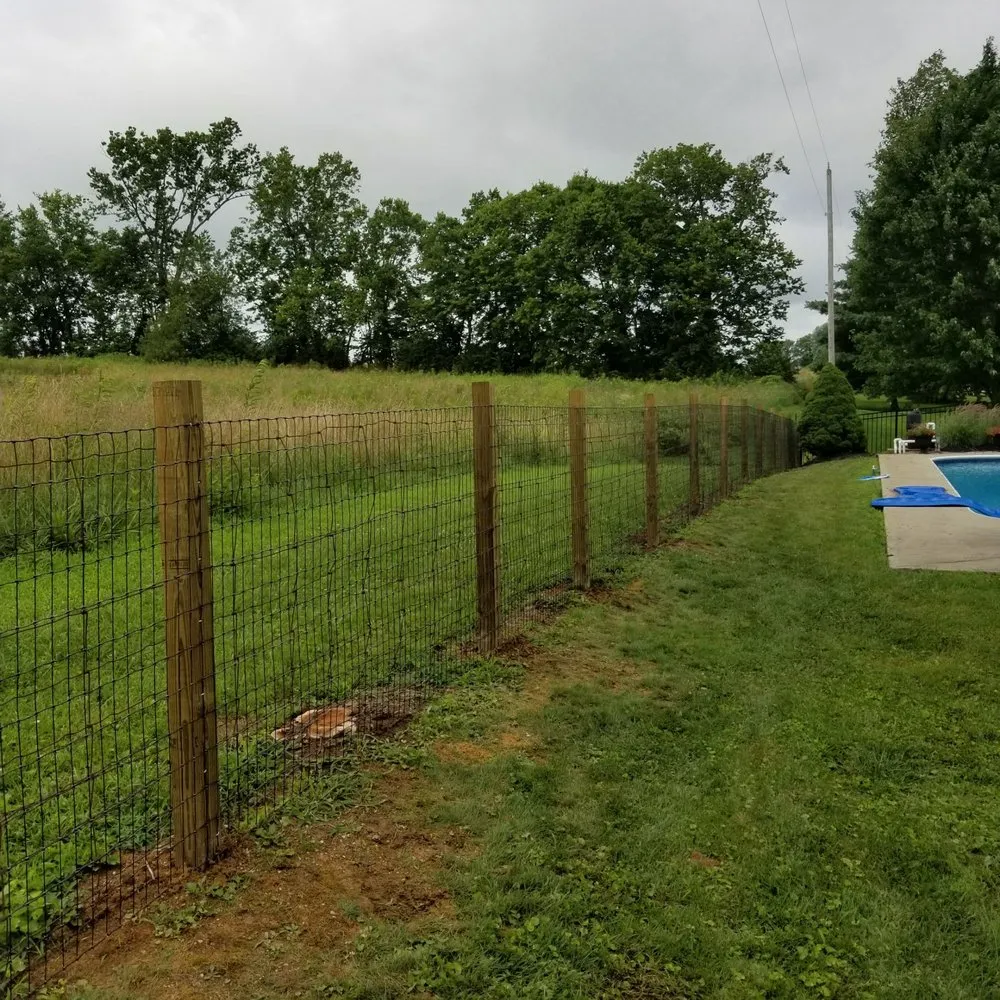 Slide of Custom Fence and Roofing