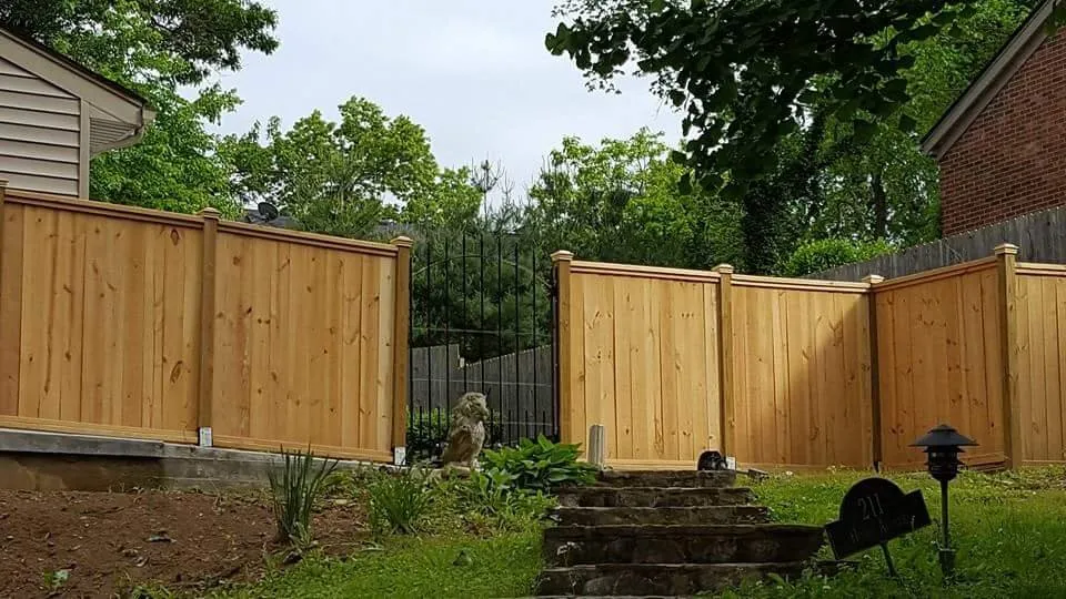 Slide of Custom Fence and Roofing