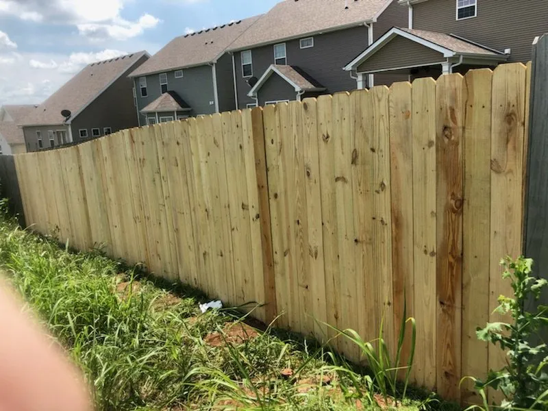 Slide of Custom Fence and Roofing