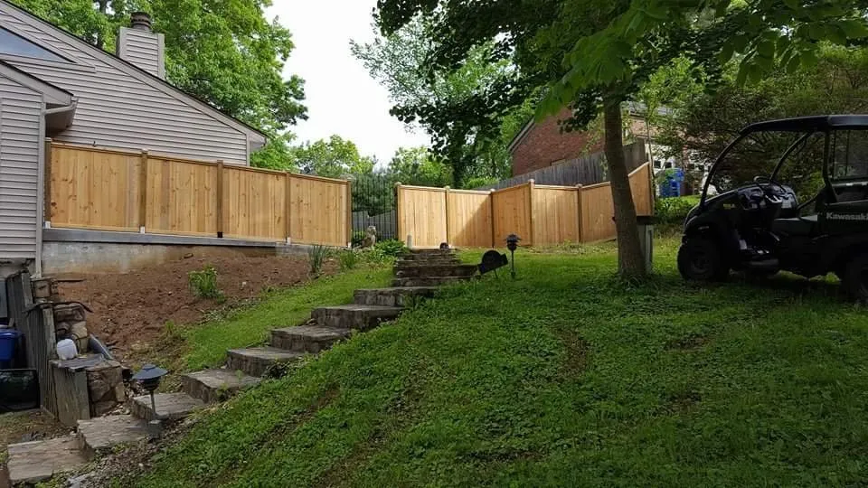 Slide of Custom Fence and Roofing