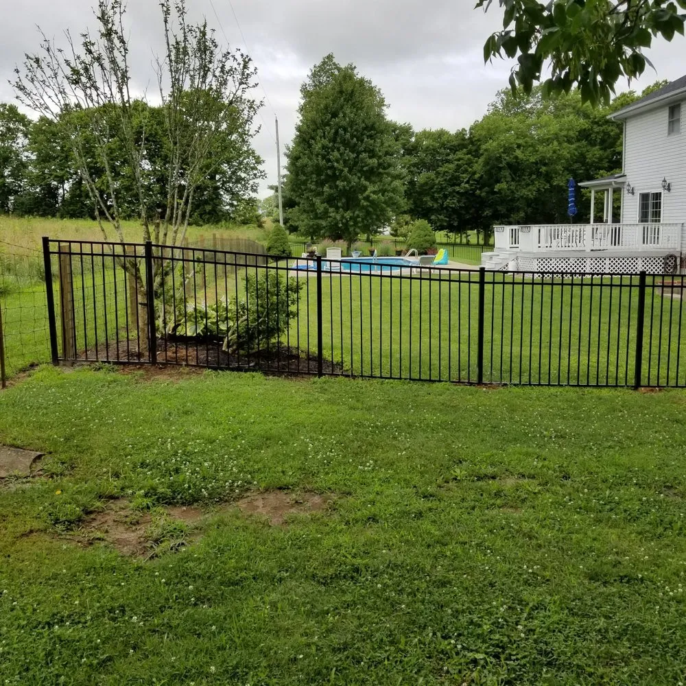Slide of Custom Fence and Roofing