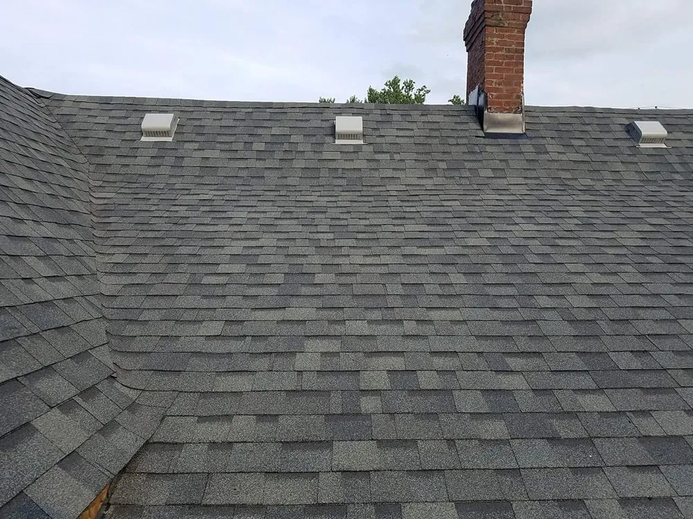 Slide of Custom Fence and Roofing