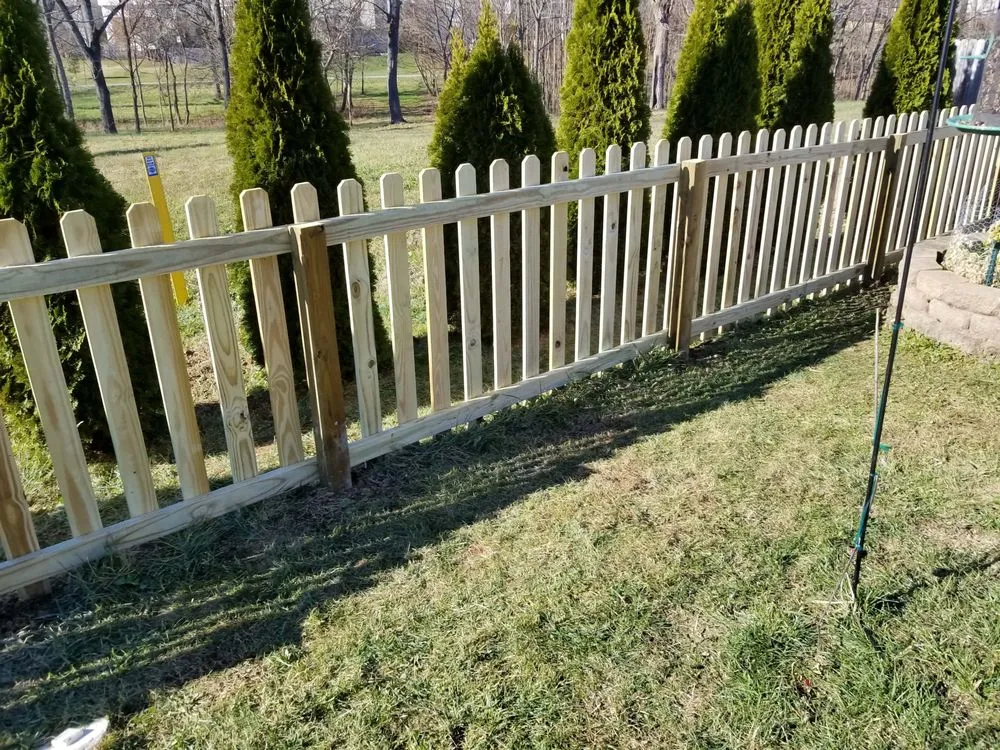 Slide of Custom Fence and Roofing