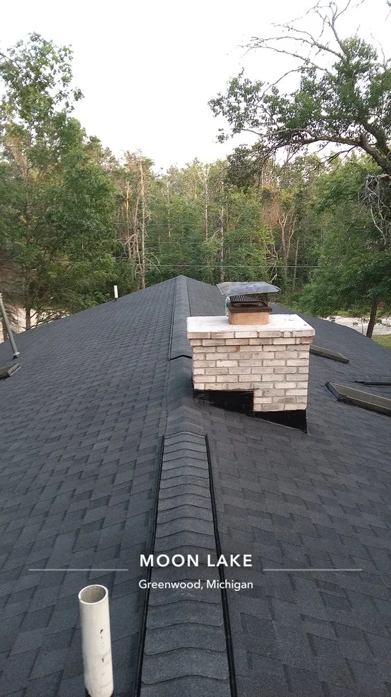 Trusted roof replacement in Lewiston, MI by Custom Home Enterprises