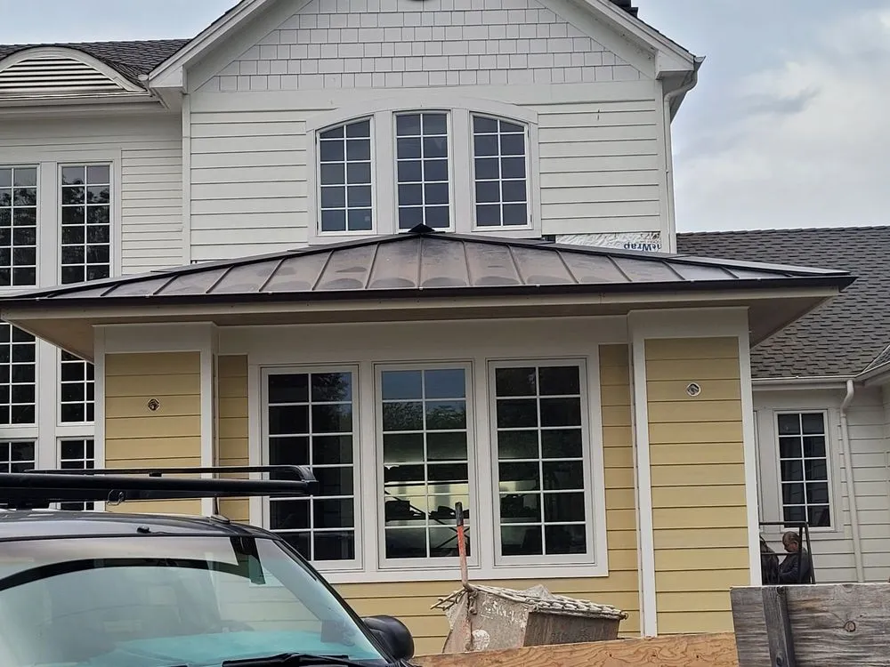 Slide of Custom Roof Crafters