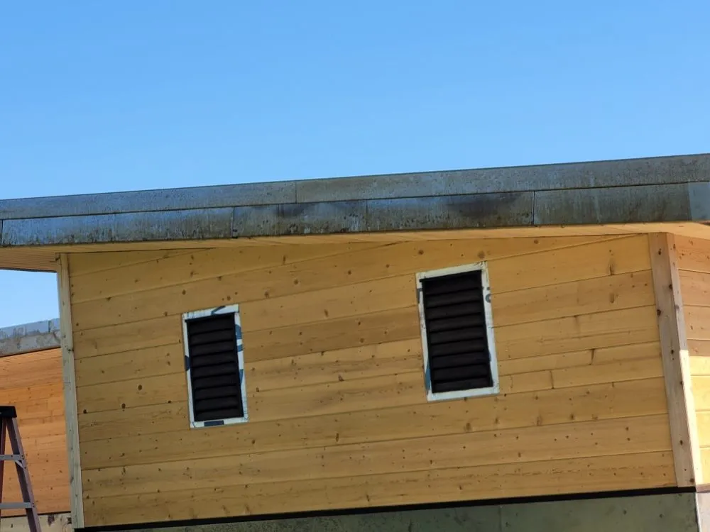 Slide of Custom Roof Crafters