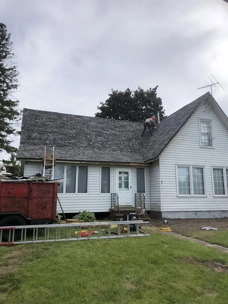 Slide of Custom Roofing & Tree Specialists