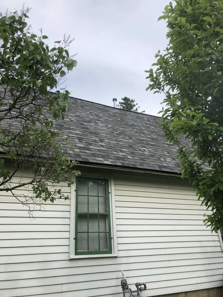 Slide of Custom Roofing & Tree Specialists