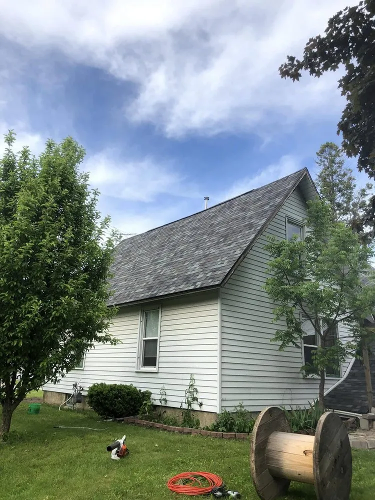 Slide of Custom Roofing & Tree Specialists