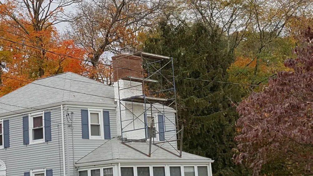 Licensed flat roof repair experts serving Vernon Rockville, CT - Custom Roofing Chimney Service