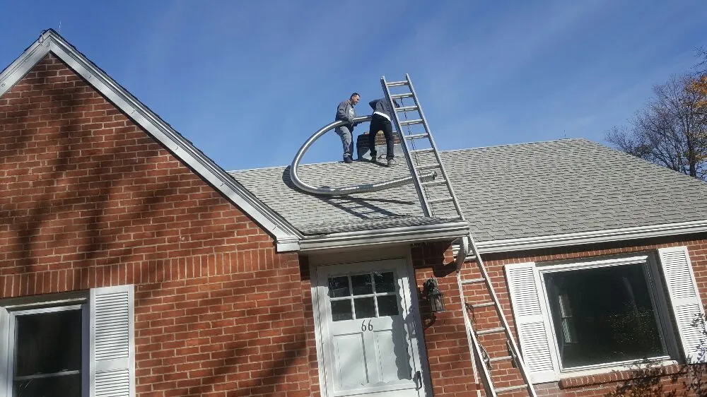 Professional flat roof repair in Vernon Rockville, CT by Custom Roofing Chimney Service