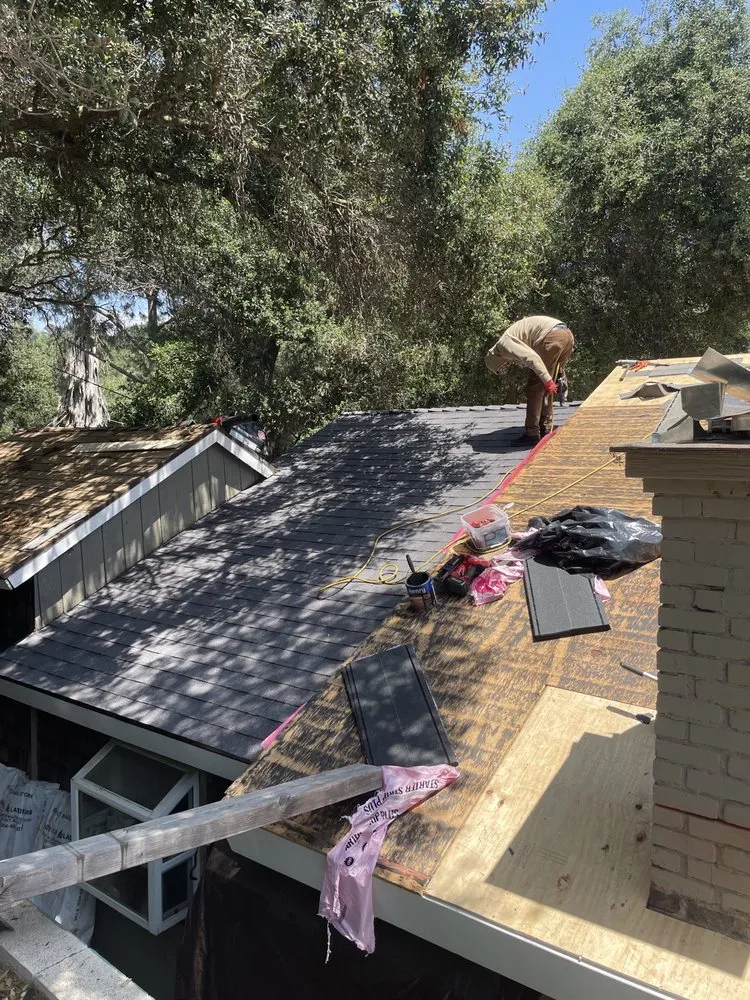 Slide of CV Roofing Services