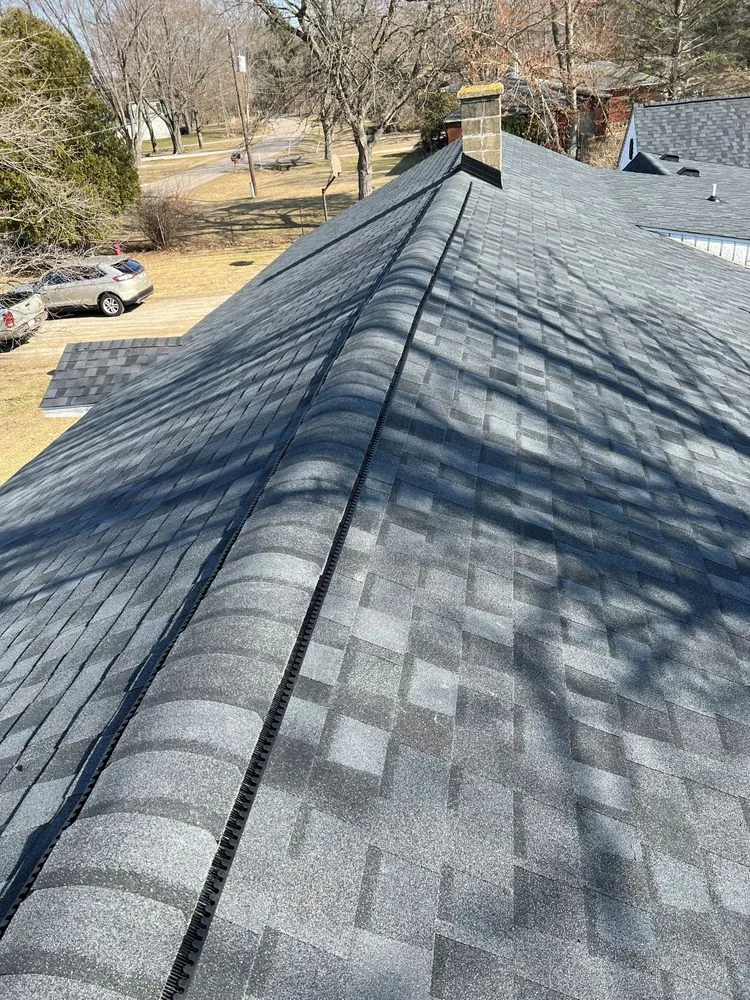 Slide of CW Roofing