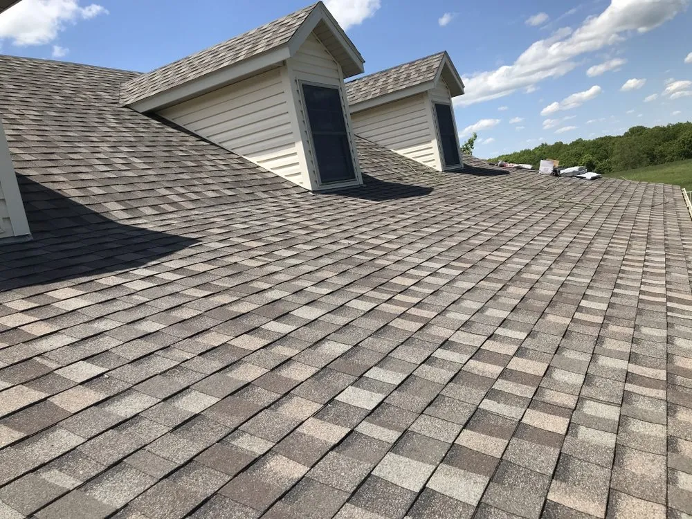 Slide of Cypret Roofing