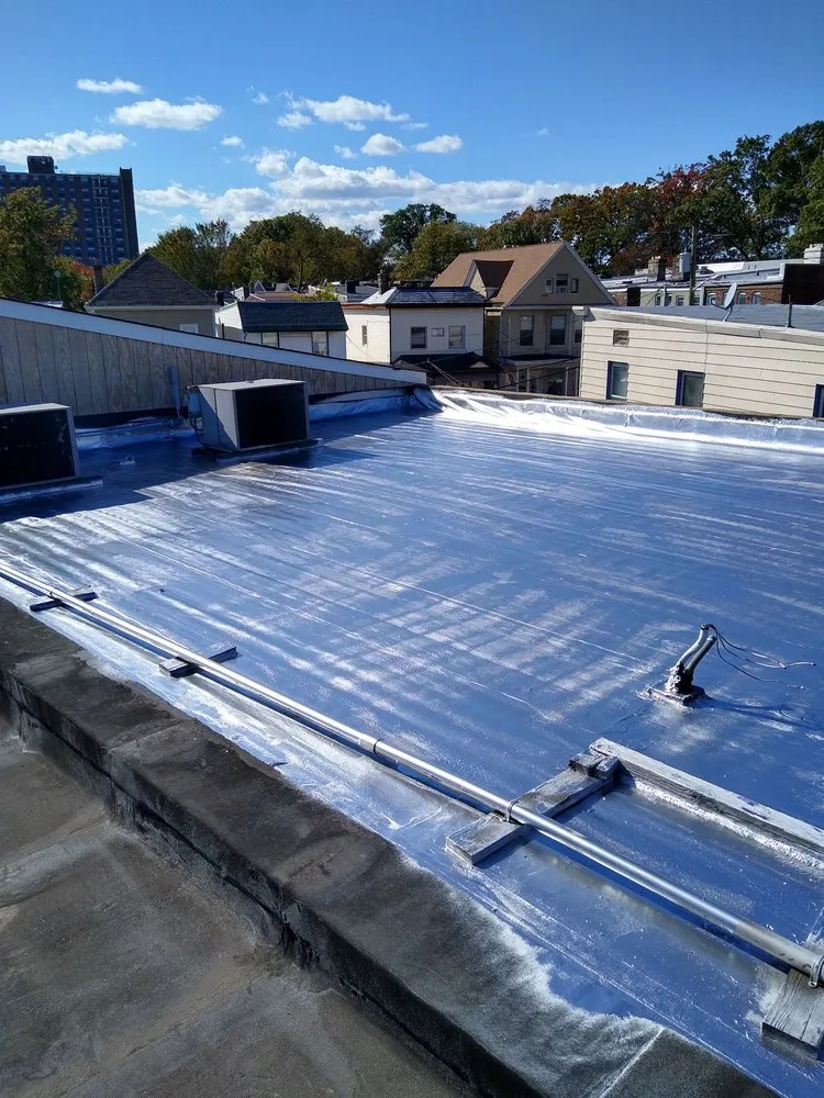 Slide of D & E Roofing and Paving