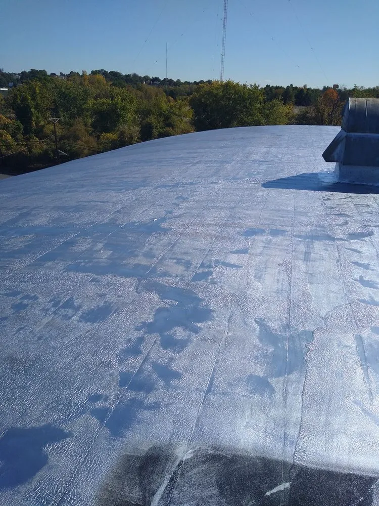 Slide of D & E Roofing and Paving