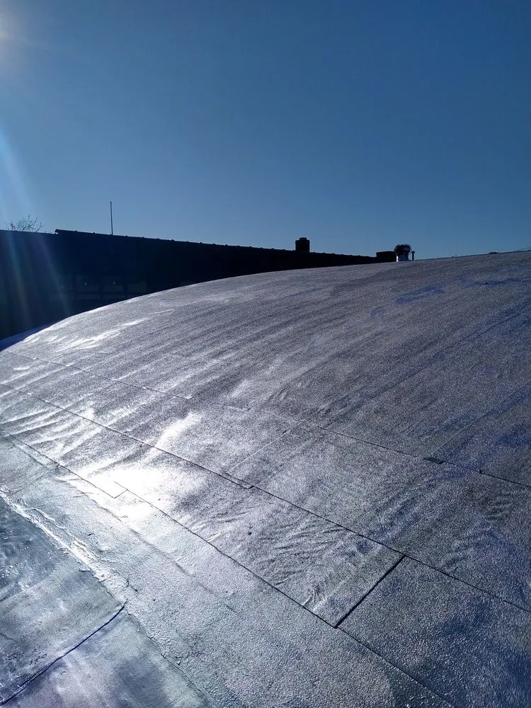 Slide of D & E Roofing and Paving