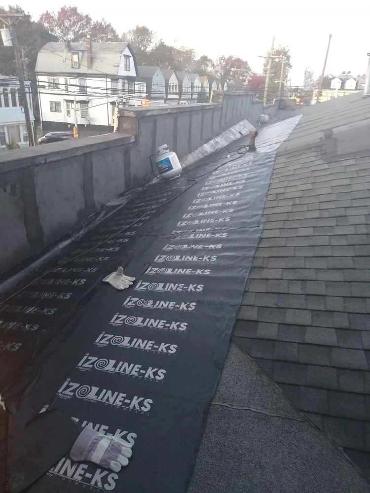 Slide of D & E Roofing and Paving