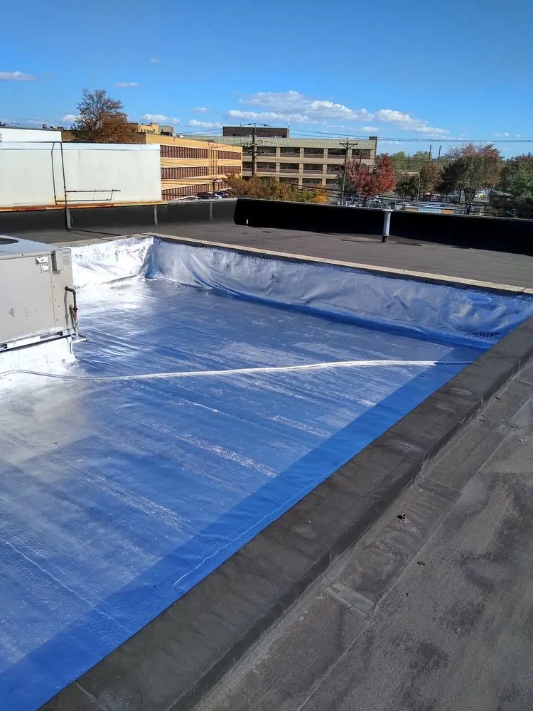 Slide of D & E Roofing and Paving