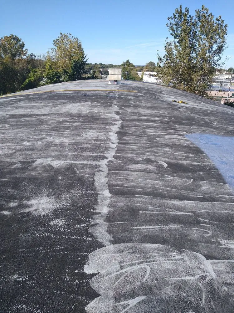 Slide of D & E Roofing and Paving