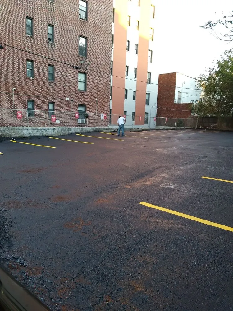 Slide of D & E Roofing and Paving