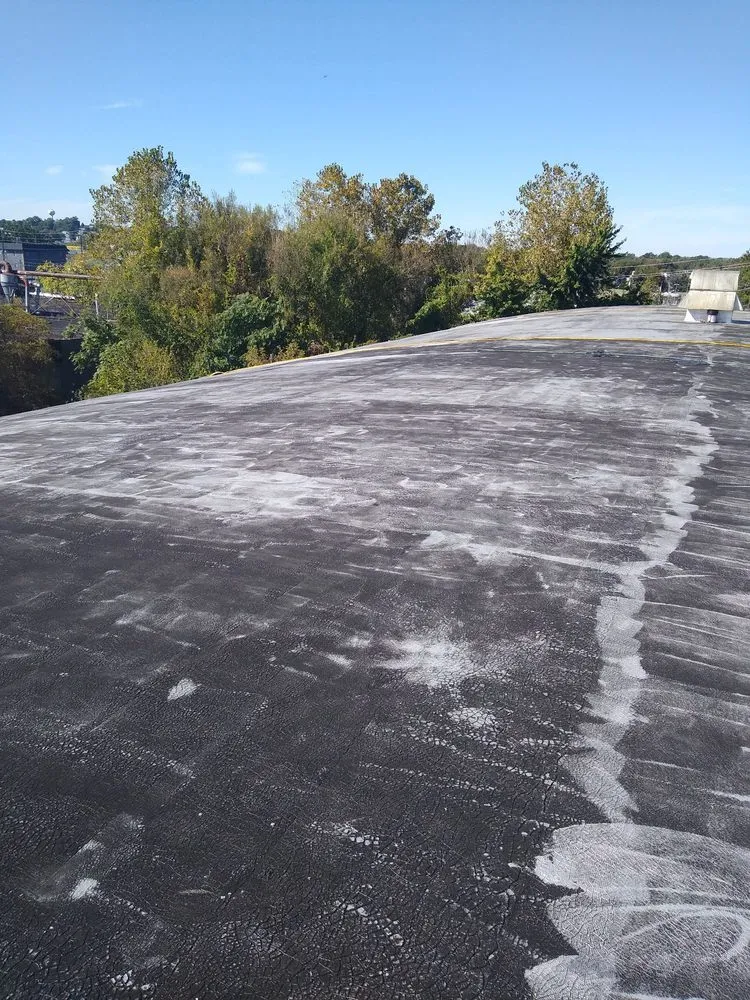 Slide of D & E Roofing and Paving