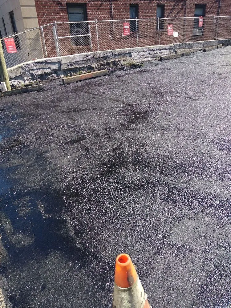 Slide of D & E Roofing and Paving