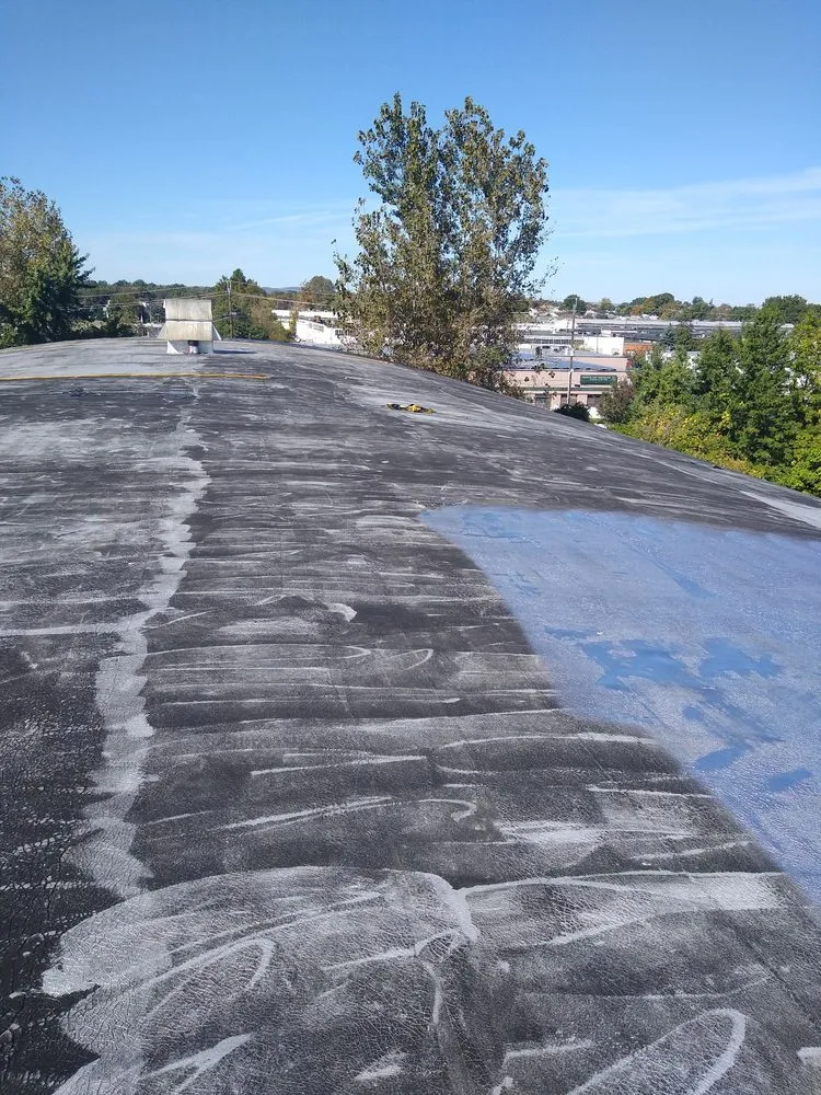 Slide of D & E Roofing and Paving