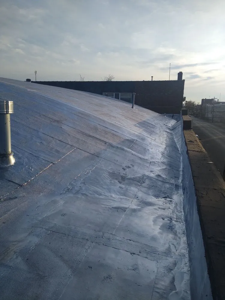 Slide of D & E Roofing and Paving