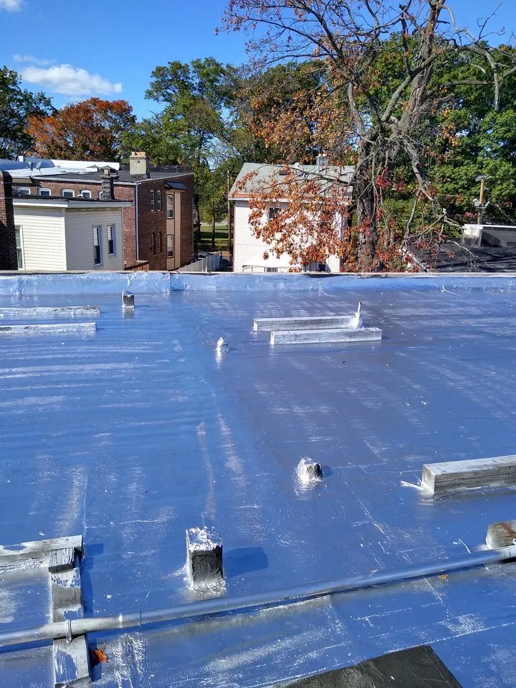 Slide of D & E Roofing and Paving