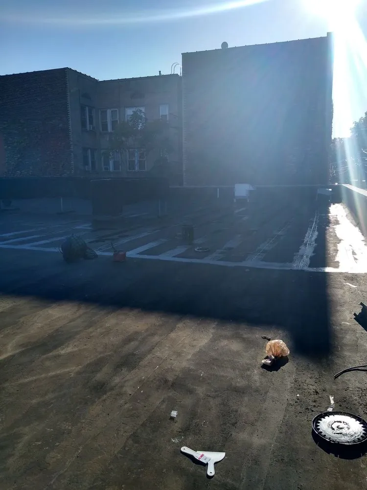 Slide of D & E Roofing and Paving